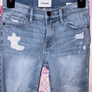 Frame Denim Light Wash Distressed Skinny Jeans